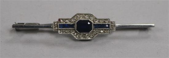 A 1920s/1930s French, platinum, synthetic sapphire and diamond set bar brooch, 54mm.